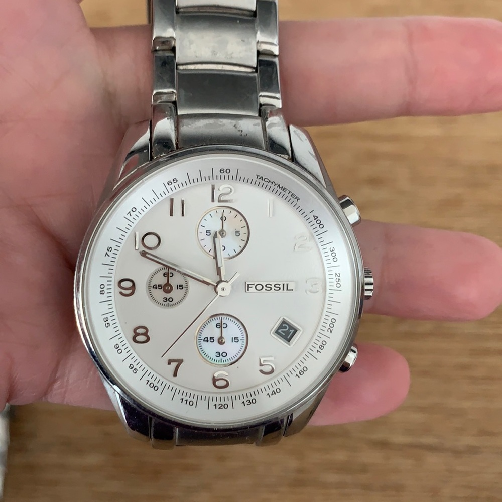 Silver fossil watch